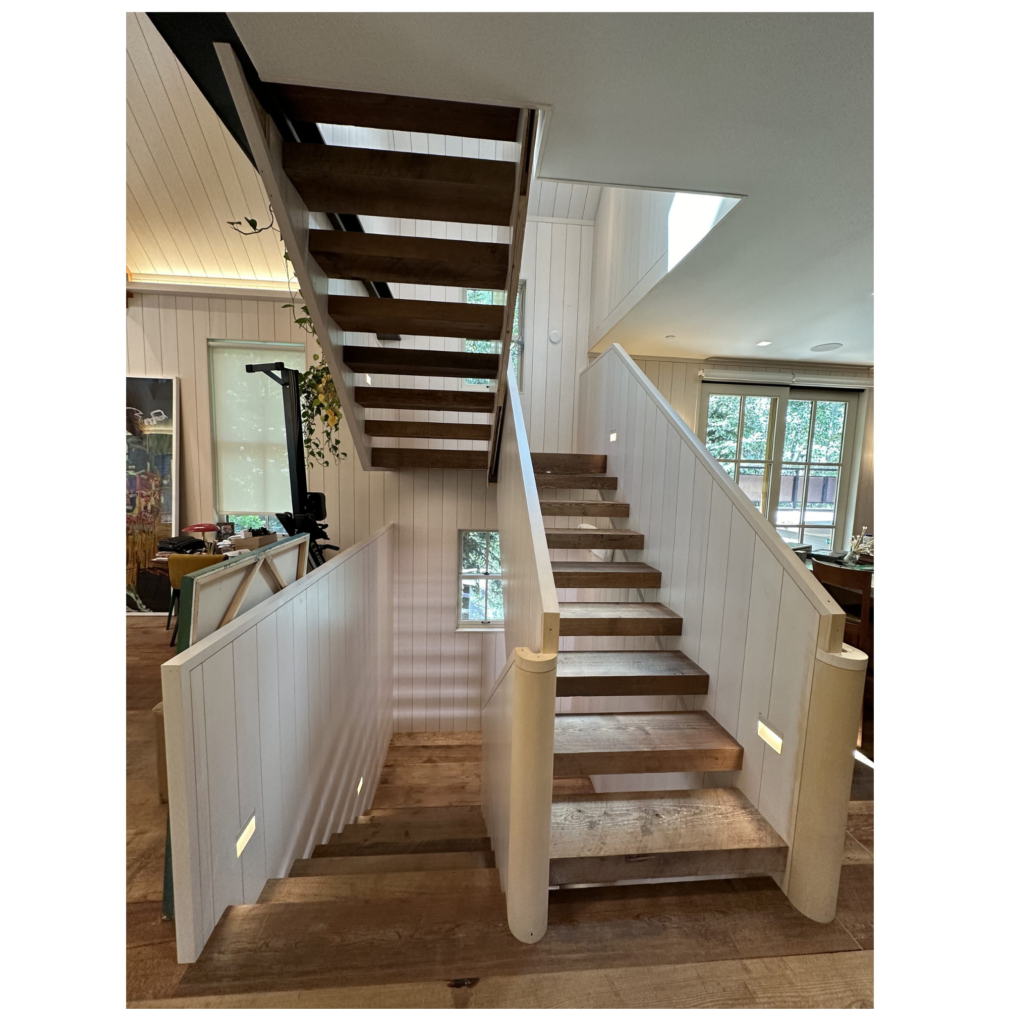 Custom staircase craftsmanship by Envision Home Design and Build